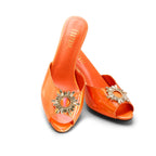 Front view of Charuse Luxury orange 3-inch mule heel with crystal embellishment in extended women's sizes US 9–13 (EU 40–46).
